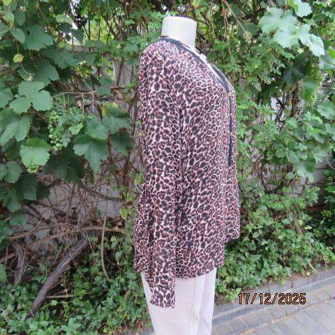 Animal print long sleeve brown-cream-black thin polycotton top. V neck with black edging. Size 44