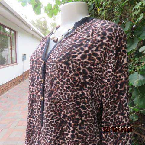 Animal print long sleeve brown-cream-black thin polycotton top. V neck with black edging. Size 44