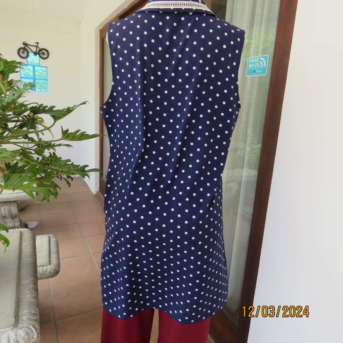 LIMITE Netherlands navy-white polkadot  long polyester top. Collar.Front opening.Size 40.