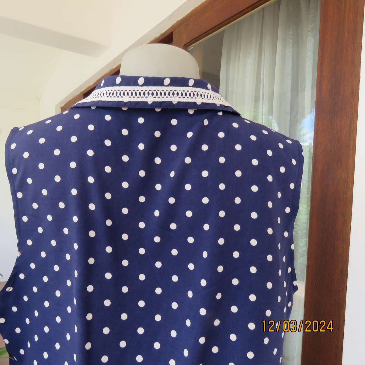 LIMITE Netherlands navy-white polkadot  long polyester top. Collar.Front opening.Size 40.