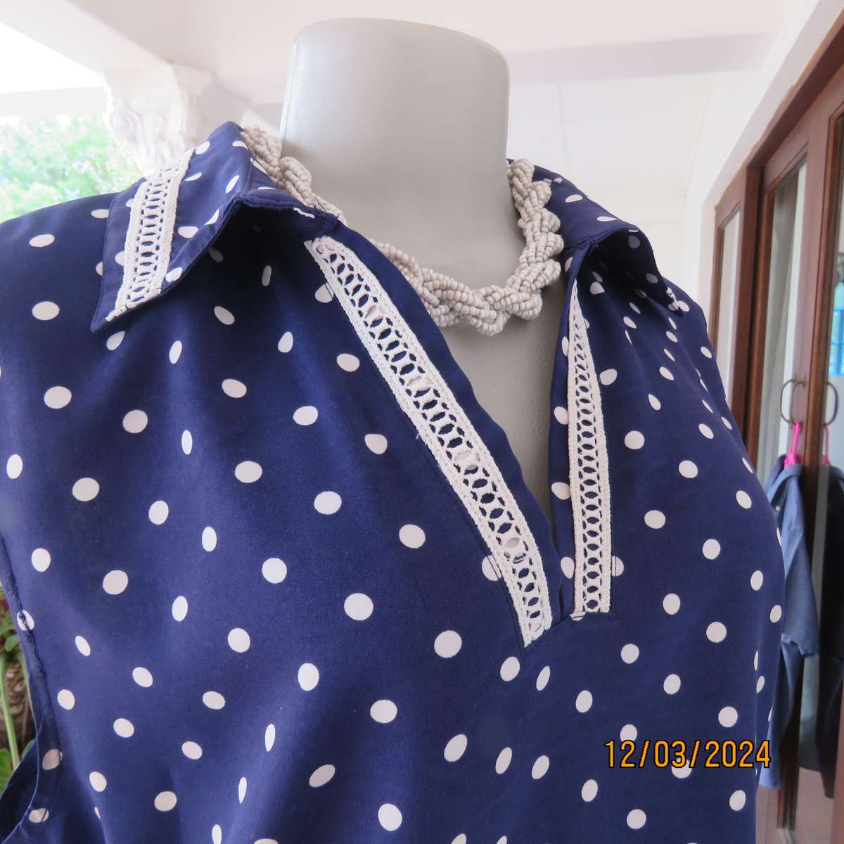 LIMITE Netherlands navy-white polkadot  long polyester top. Collar.Front opening.Size 40.