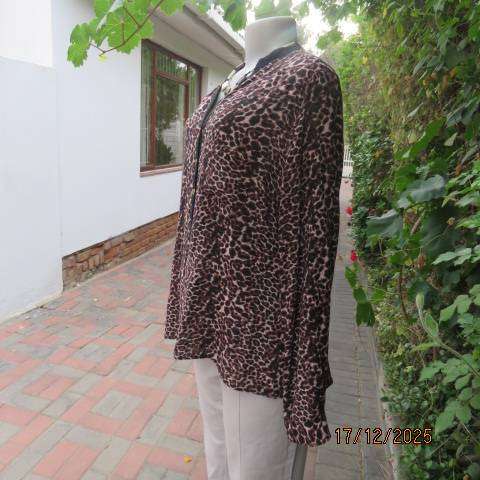 Animal print long sleeve brown-cream-black thin polycotton top. V neck with black edging. Size 44