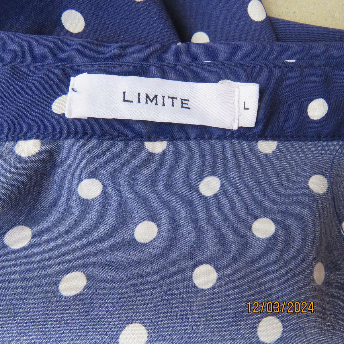 LIMITE Netherlands navy-white polkadot  long polyester top. Collar.Front opening.Size 40.