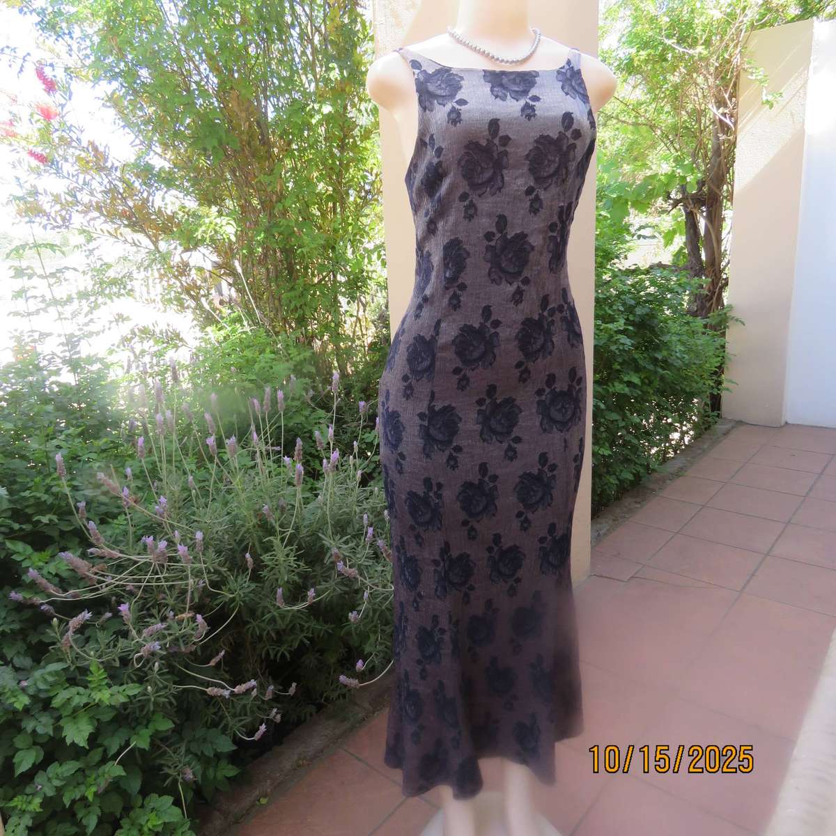 Silver vertical crinkled sleek nylon-rayon dress with navy embossed flowers. Size 36