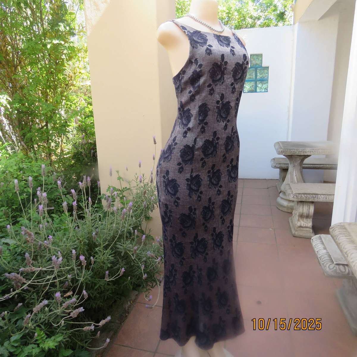 Silver vertical crinkled sleek nylon-rayon dress with navy embossed flowers. Size 36