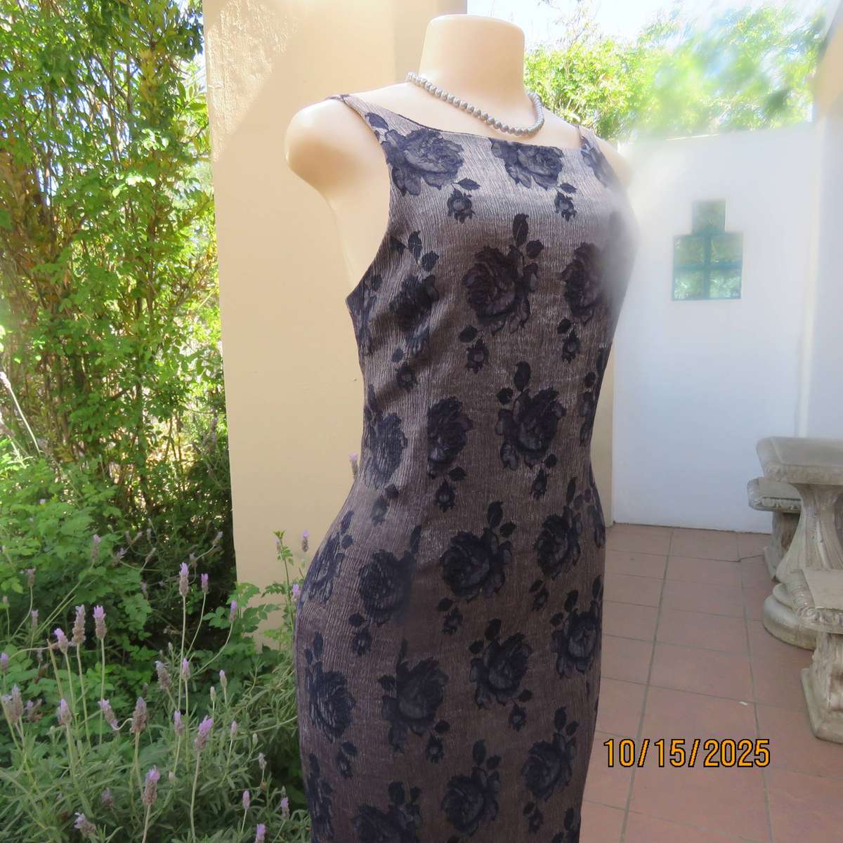Silver vertical crinkled sleek nylon-rayon dress with navy embossed flowers. Size 36