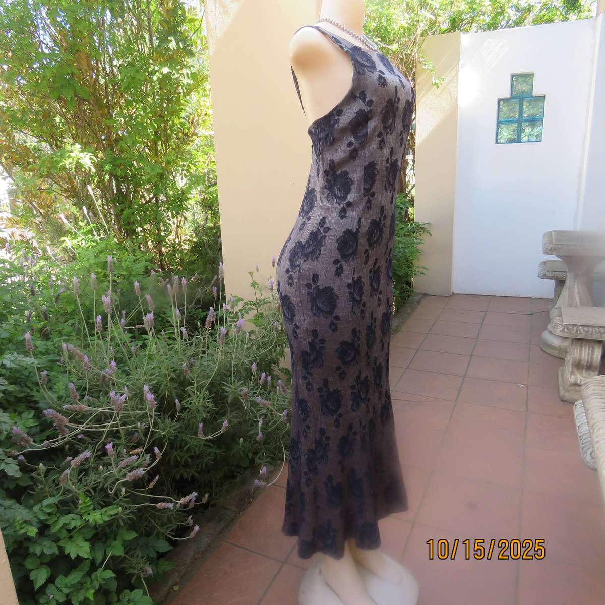 Silver vertical crinkled sleek nylon-rayon dress with navy embossed flowers. Size 36