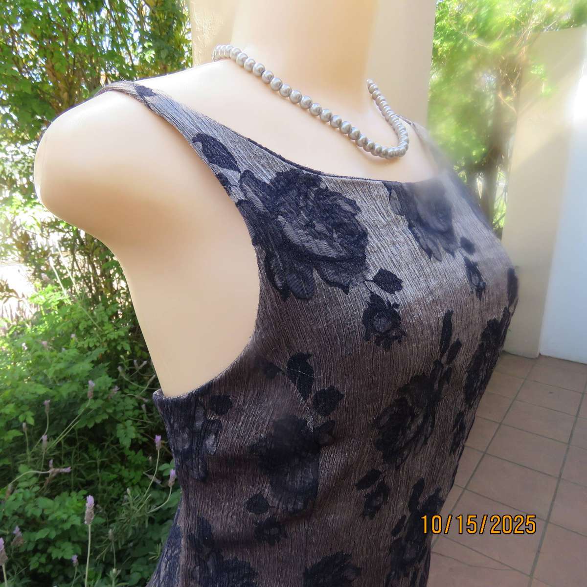 Silver vertical crinkled sleek nylon-rayon dress with navy embossed flowers. Size 36