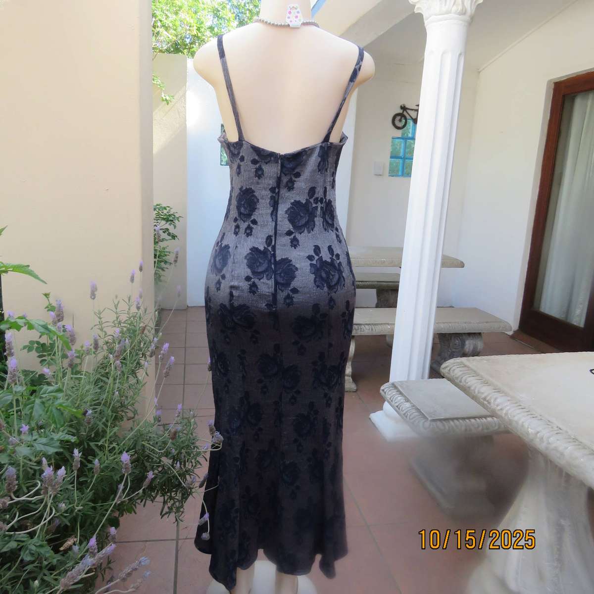 Silver vertical crinkled sleek nylon-rayon dress with navy embossed flowers. Size 36