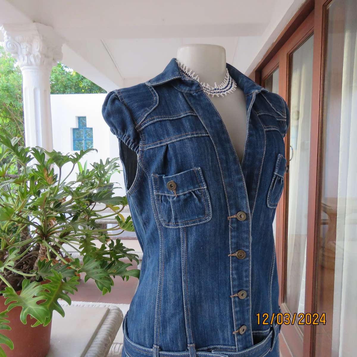 Trendy 100% cotton blue denim jean top-dress. Button down. Yoked. Capped sleeves.Belt.Size 36