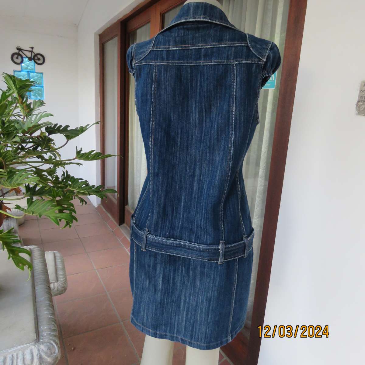 Trendy 100% cotton blue denim jean top-dress. Button down. Yoked. Capped sleeves.Belt.Size 36