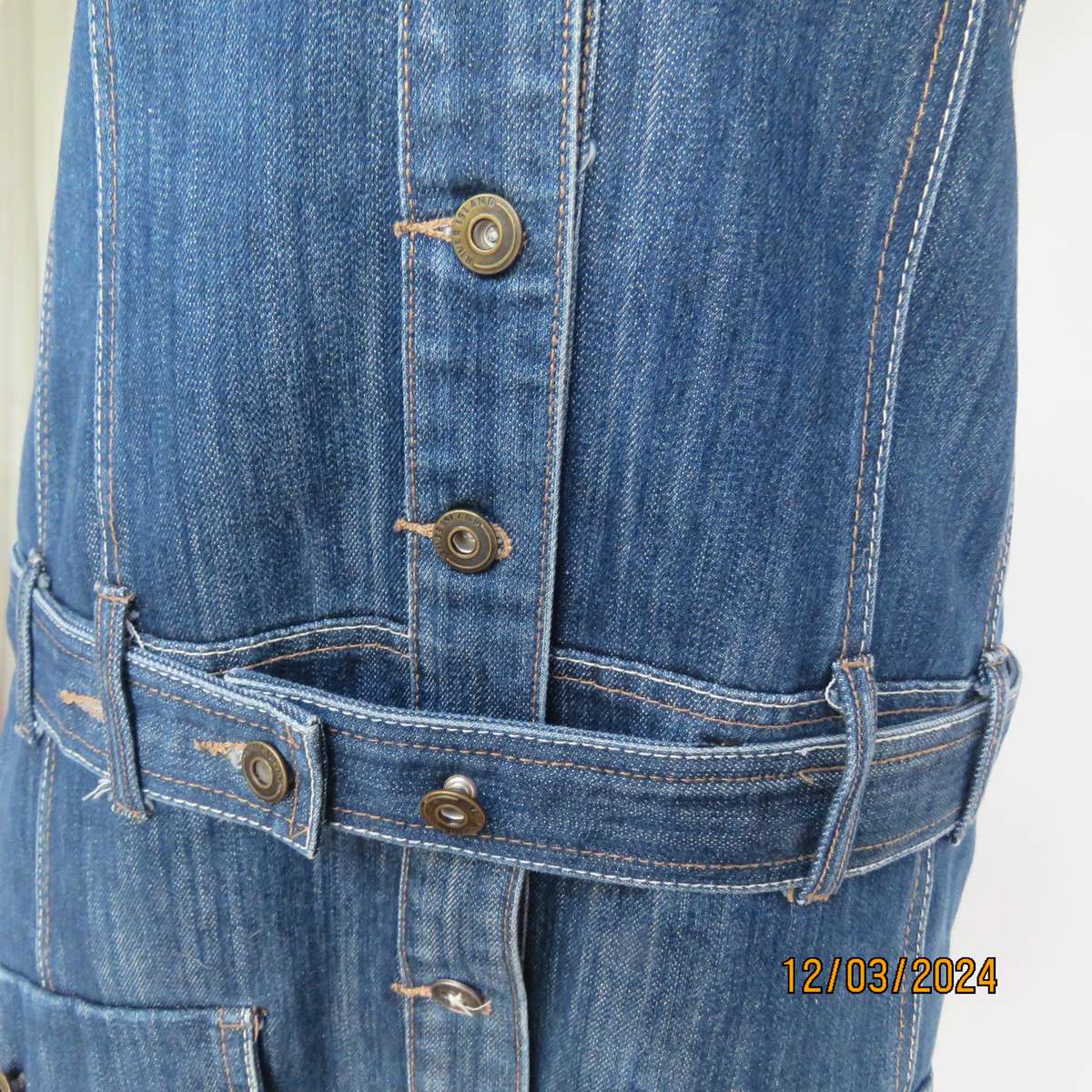 Trendy 100% cotton blue denim jean top-dress. Button down. Yoked. Capped sleeves.Belt.Size 36