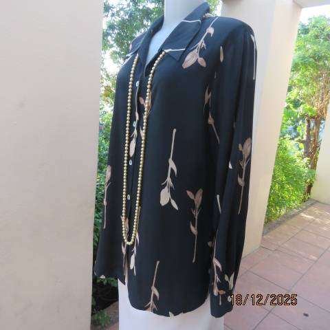 BODY RAP black polyester long sleeve button down top with single golden cream flowers. Size 38