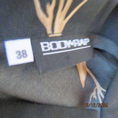 BODY RAP black polyester long sleeve button down top with single golden cream flowers. Size 38
