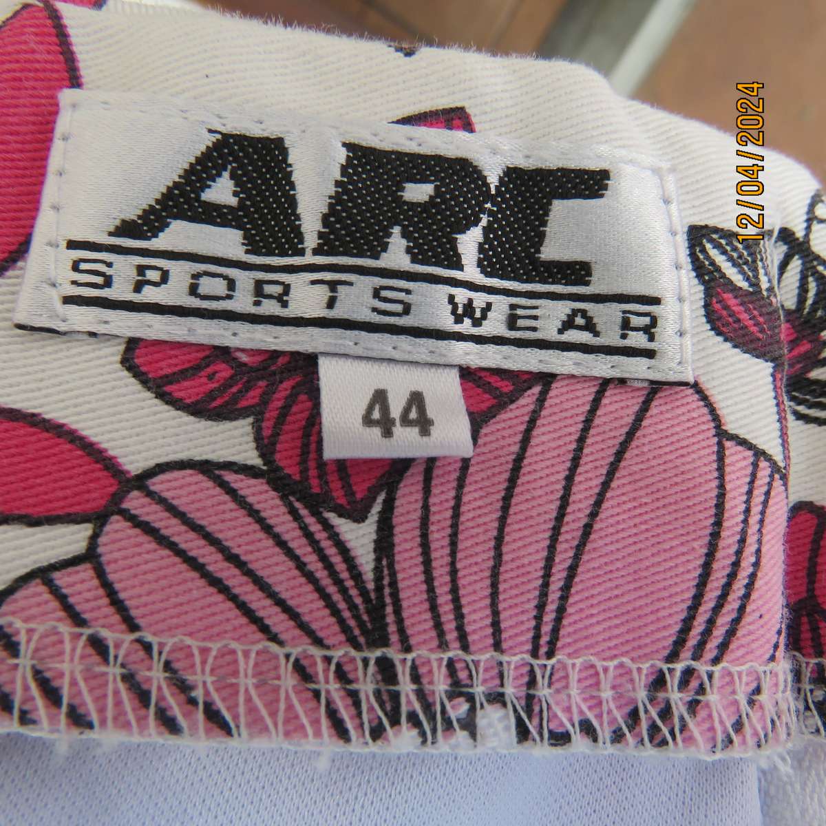 High quality heavy stretch white cotton-pink floral skirt. Size 36 by ARC Sportswear.With shorts.