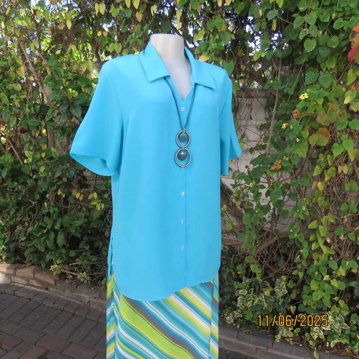 TOGETHER light turquoise short sleeve silky polyester open v collar top. Size 40.