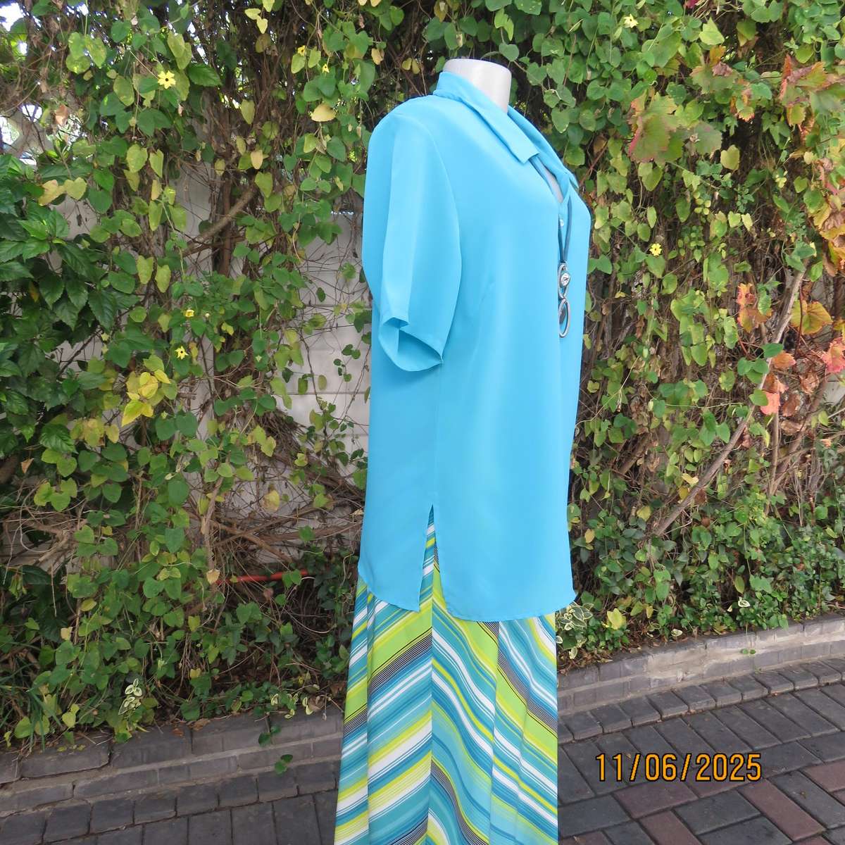TOGETHER light turquoise short sleeve silky polyester open v collar top. Size 40.