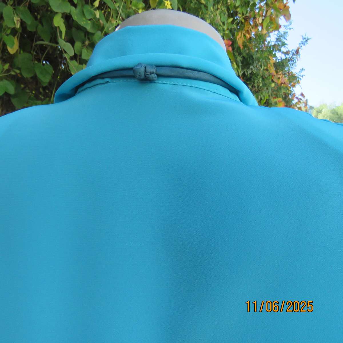 TOGETHER light turquoise short sleeve silky polyester open v collar top. Size 40.