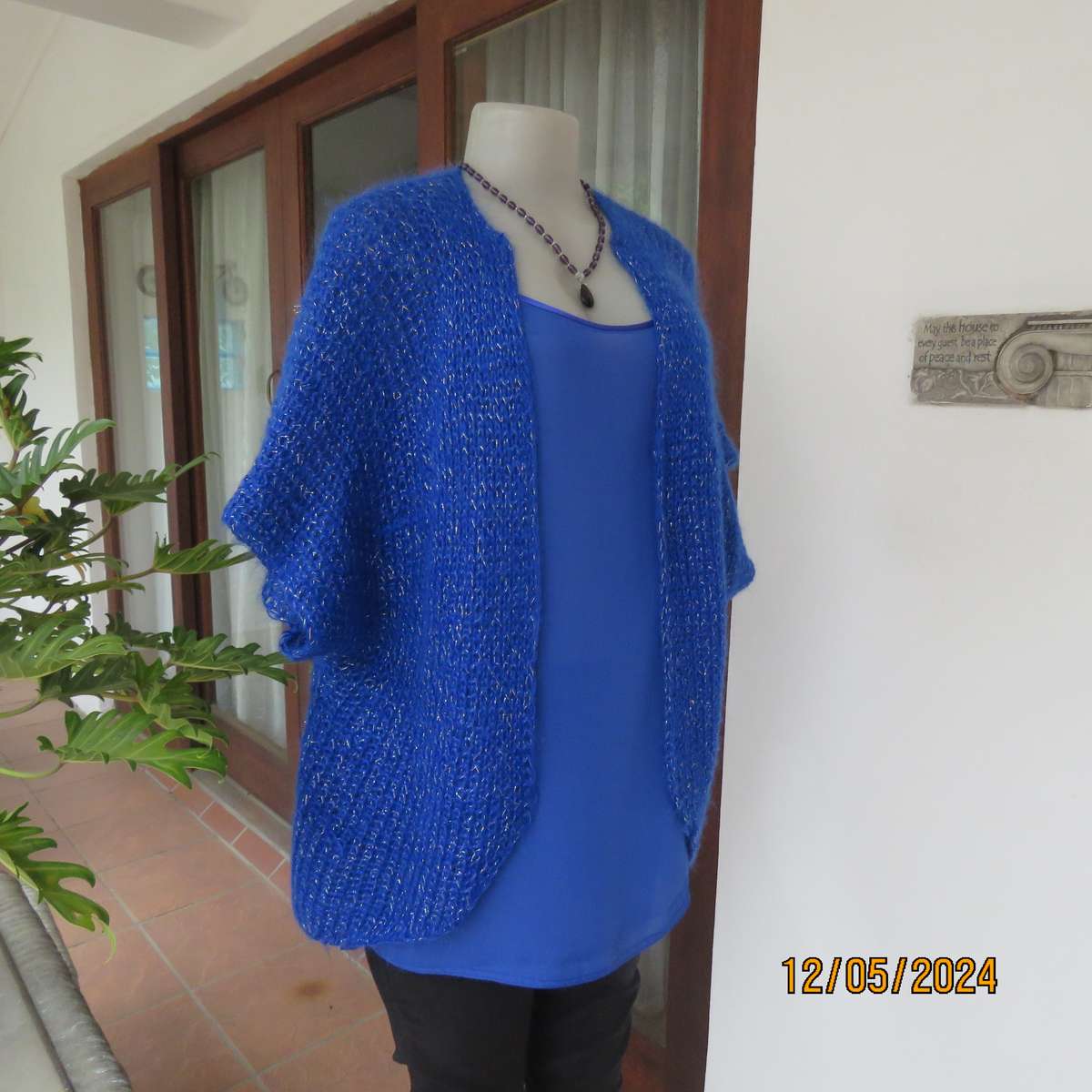 Glamorous azure blue with silver thread acrylic knitted cover-up. size 40-42. Handknitted.As new