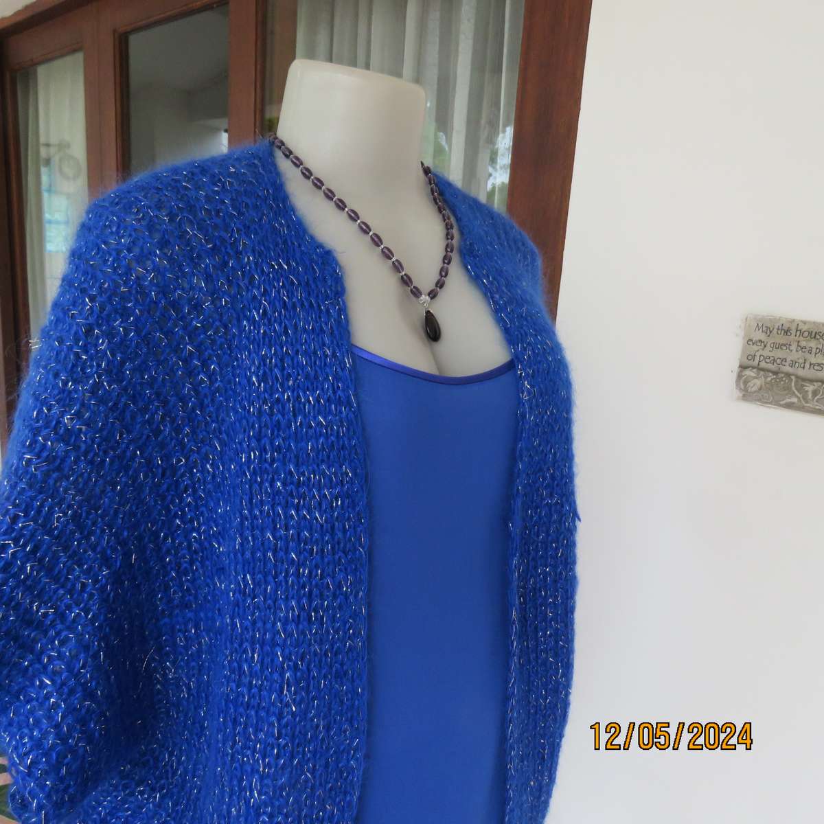 Glamorous azure blue with silver thread acrylic knitted cover-up. size 40-42. Handknitted.As new