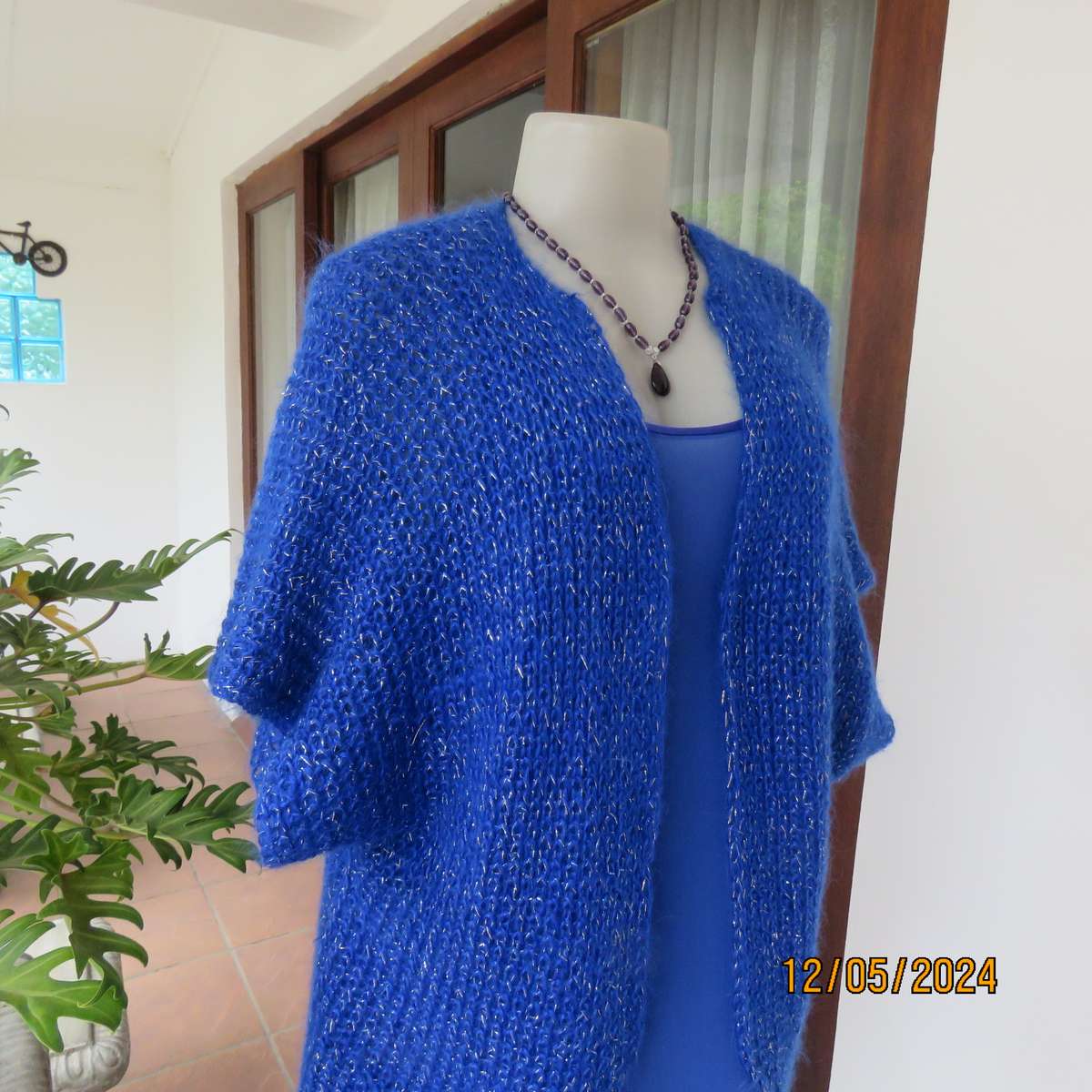 Glamorous azure blue with silver thread acrylic knitted cover-up. size 40-42. Handknitted.As new