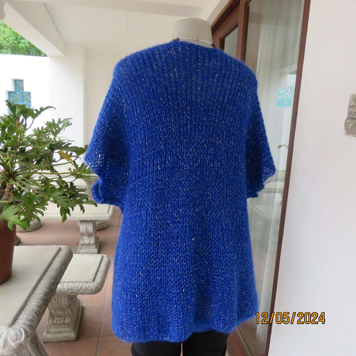 Glamorous azure blue with silver thread acrylic knitted cover-up. size 40-42. Handknitted.As new
