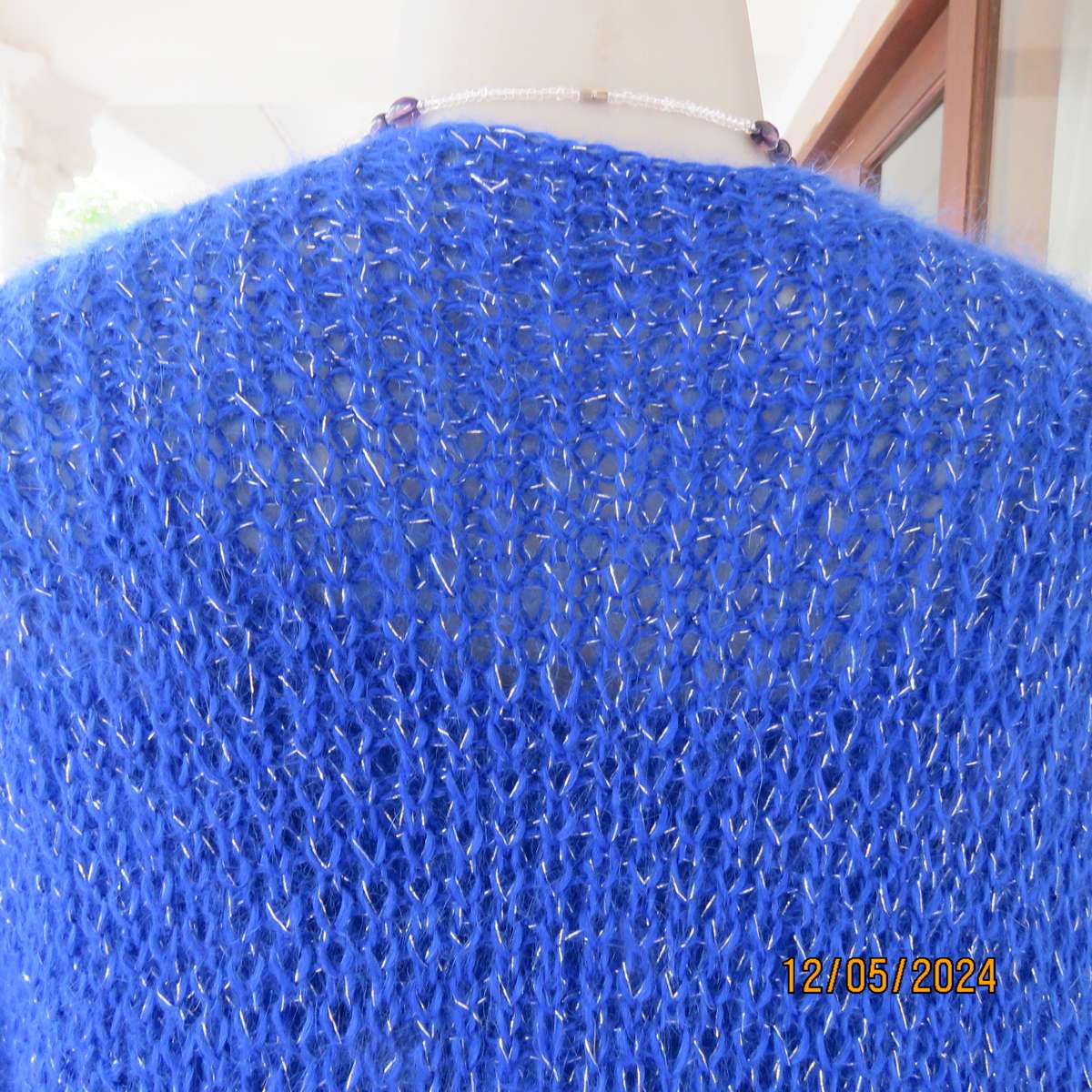 Glamorous azure blue with silver thread acrylic knitted cover-up. size 40-42. Handknitted.As new
