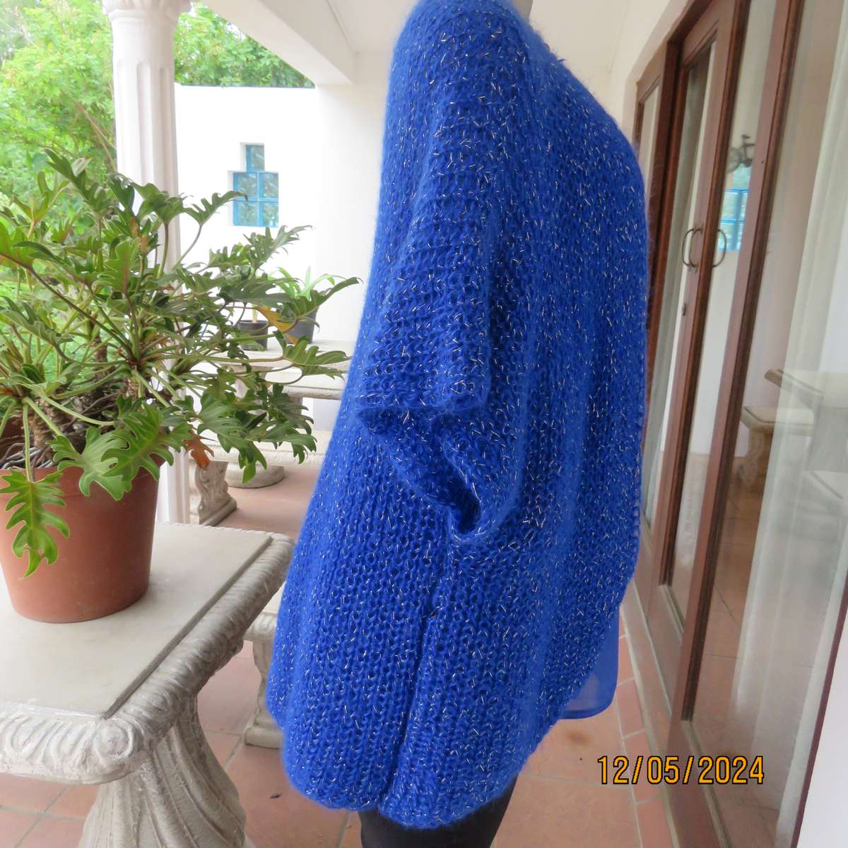 Glamorous azure blue with silver thread acrylic knitted cover-up. size 40-42. Handknitted.As new