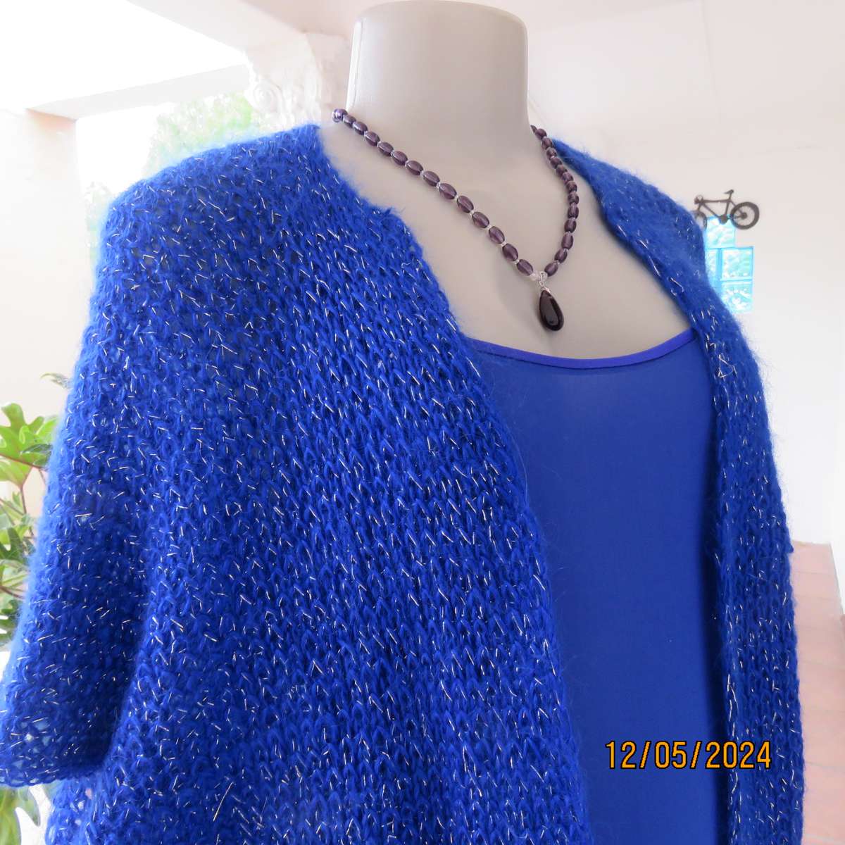 Glamorous azure blue with silver thread acrylic knitted cover-up. size 40-42. Handknitted.As new