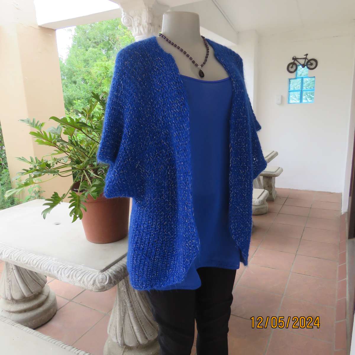 Glamorous azure blue with silver thread acrylic knitted cover-up. size 40-42. Handknitted.As new