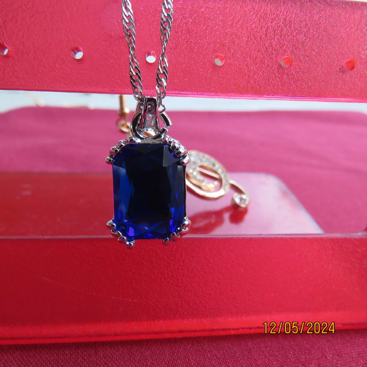 High quality jewelry set in silver with blue stones. Resembles antique jewelry. New item.