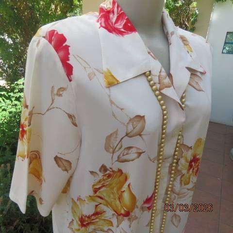 Rich cream with mustard-red bold floral print polyester short sleeve top in size 38