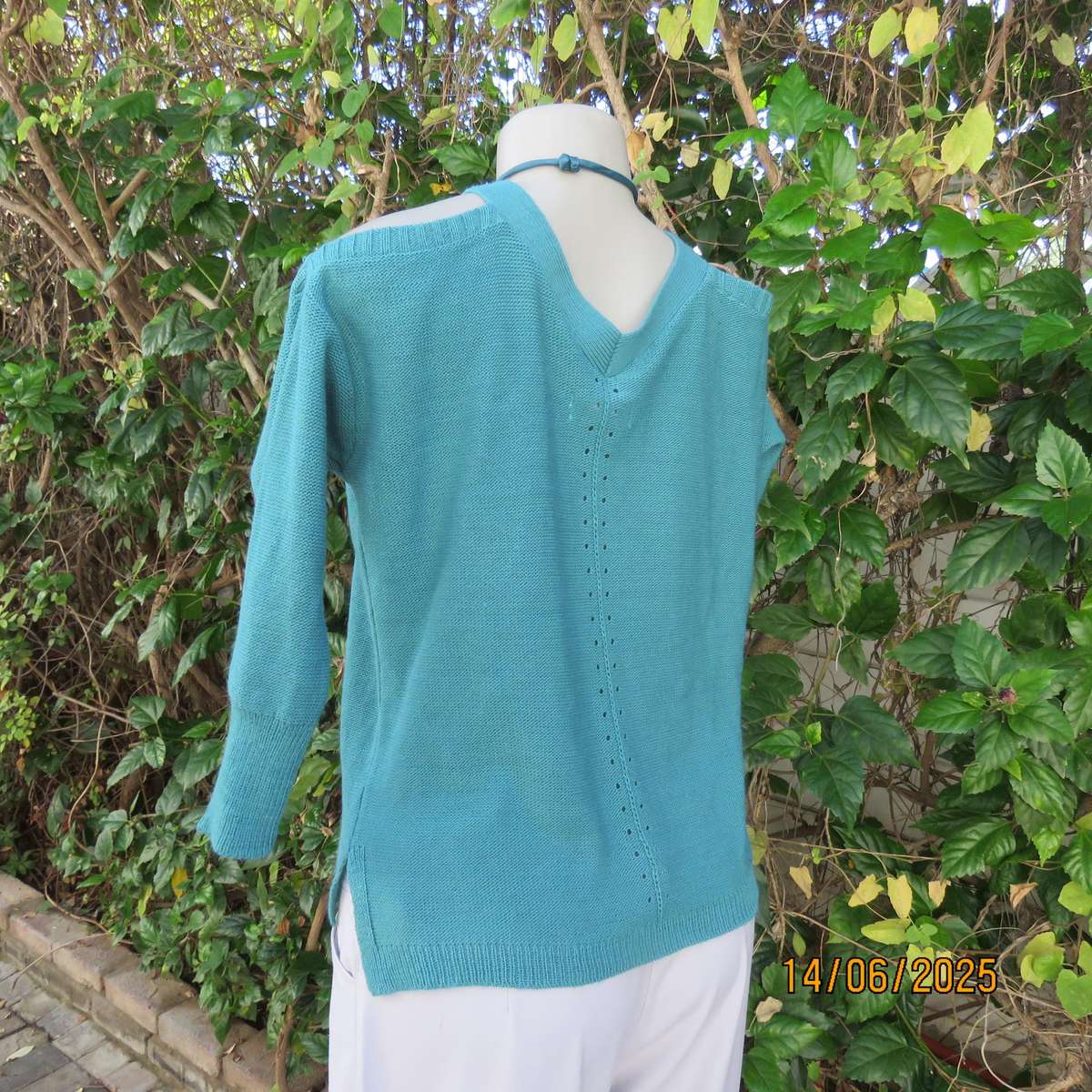 Teal colour knitted acrylic slip over naked shoulder top size 36.