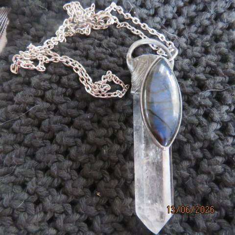 Quartz crystal point pendant with blue labradorite cabochon and kyanite stone