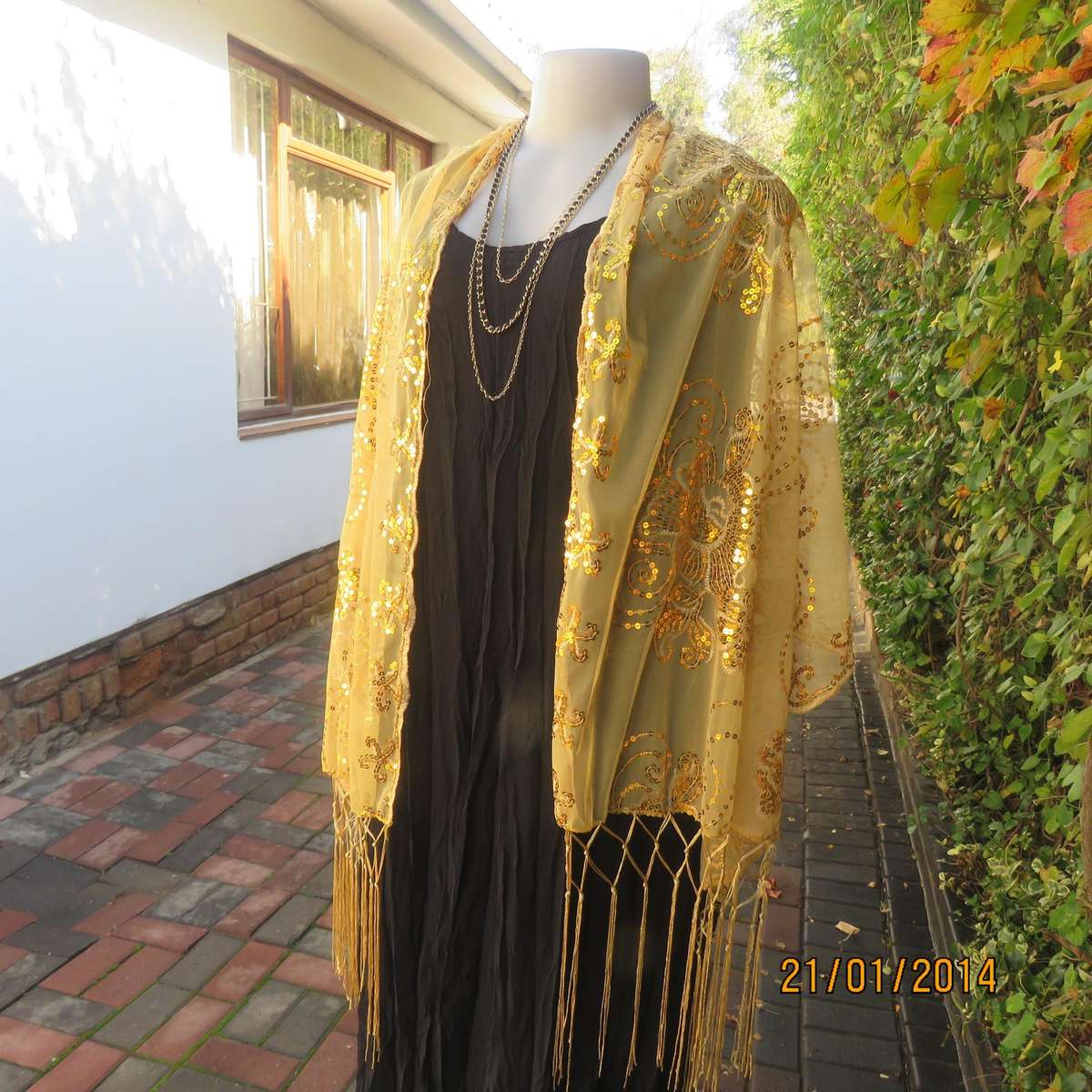 Gold colour sheer stole richly sequin decorated in floral-paisley pattern. 160cm x 65cm.