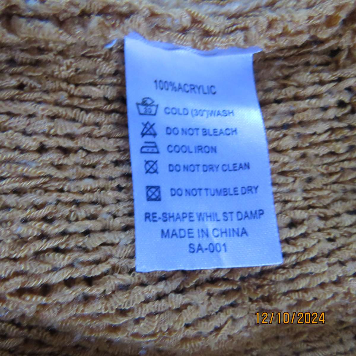 MERIEN HALL acrylic knit burnt orange colour V neck top. Tiny cut-on sleeves. Size 44. Slip over.