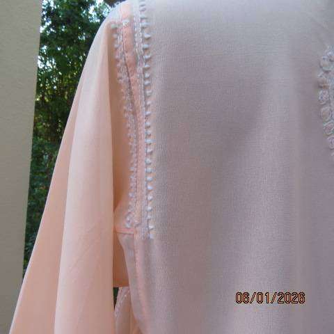 Richly embroidered soft apricot long sheer top from India. Three button front opening. Size 36