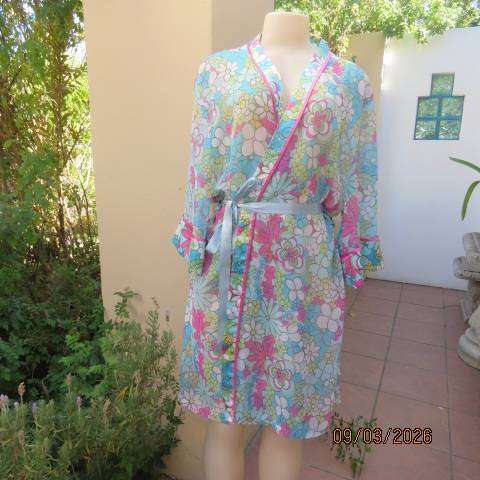 Delicates woman sheer polyester fold-over night gown with satin fronts and sleeve cuffs