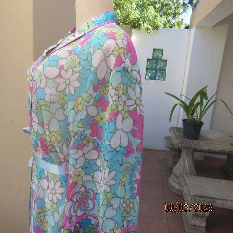 Delicates woman sheer polyester fold-over night gown with satin fronts and sleeve cuffs