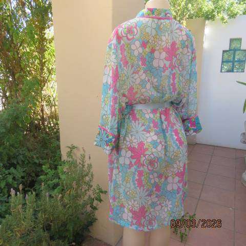 Delicates woman sheer polyester fold-over night gown with satin fronts and sleeve cuffs