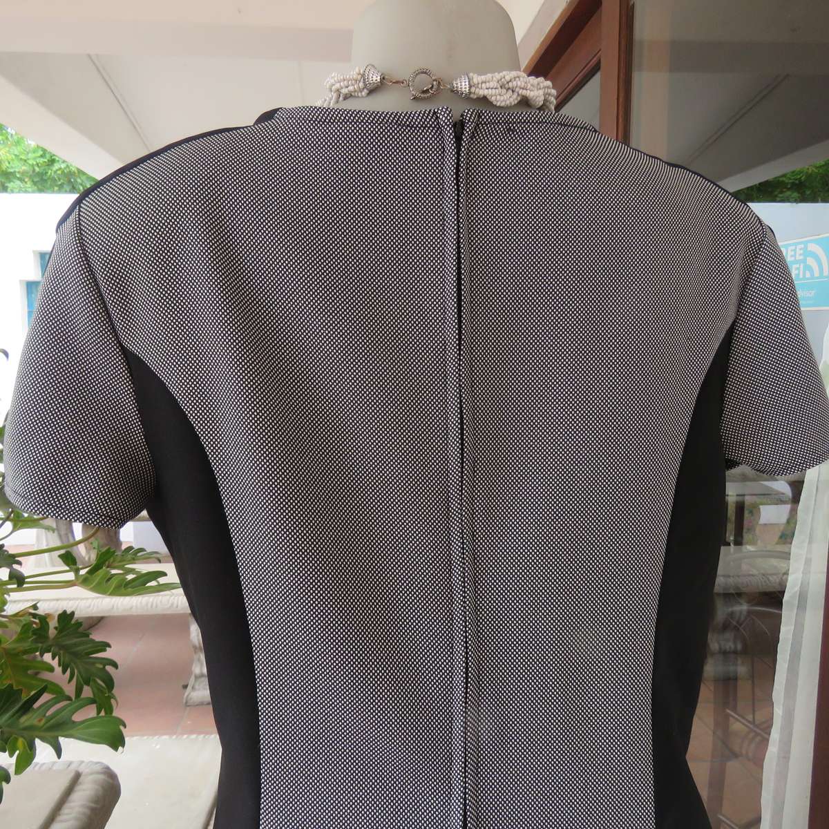 FASHION EXPRESS size 40 princess style dress in black-white with black sides. Long zip.Very good con