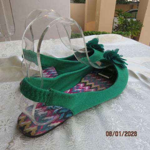 Pair grass green open heel fabric flat shoes in green with flower on front. Size 8