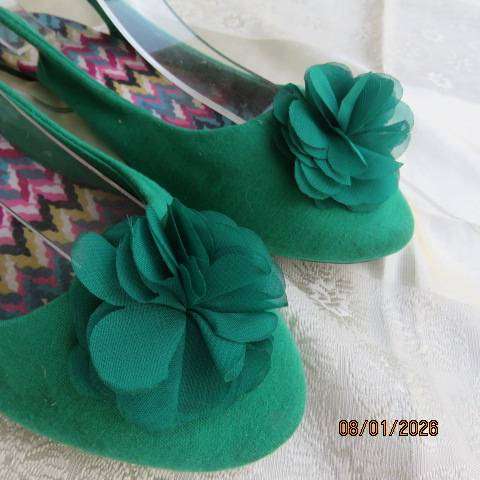 Pair grass green open heel fabric flat shoes in green with flower on front. Size 8