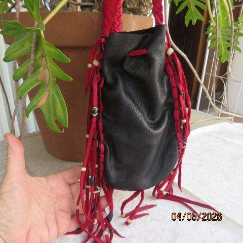 Genuine leather black handmade shoulder bag with red leather front overlay and fringed sides