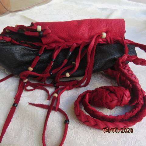 Genuine leather black handmade shoulder bag with red leather front overlay and fringed sides