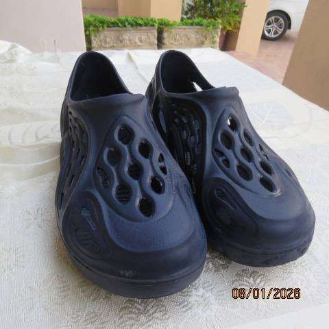Pair fake navy closed heel crocs size 5 for ladies or men.