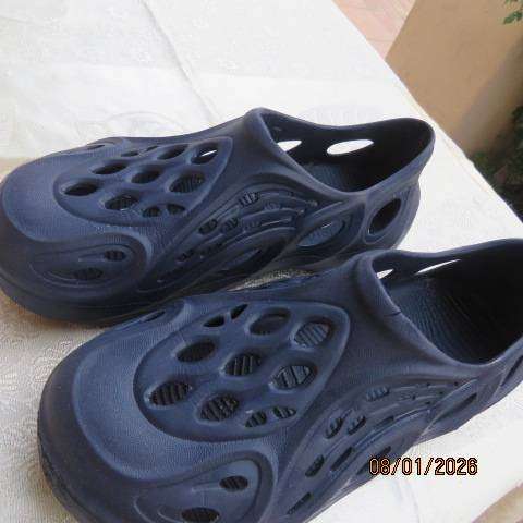 Pair fake navy closed heel crocs size 5 for ladies or men.