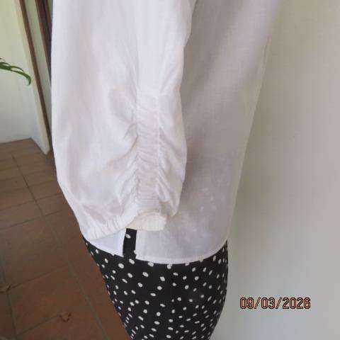 white 100% cotton slip-over top with V banded neckline, size 34