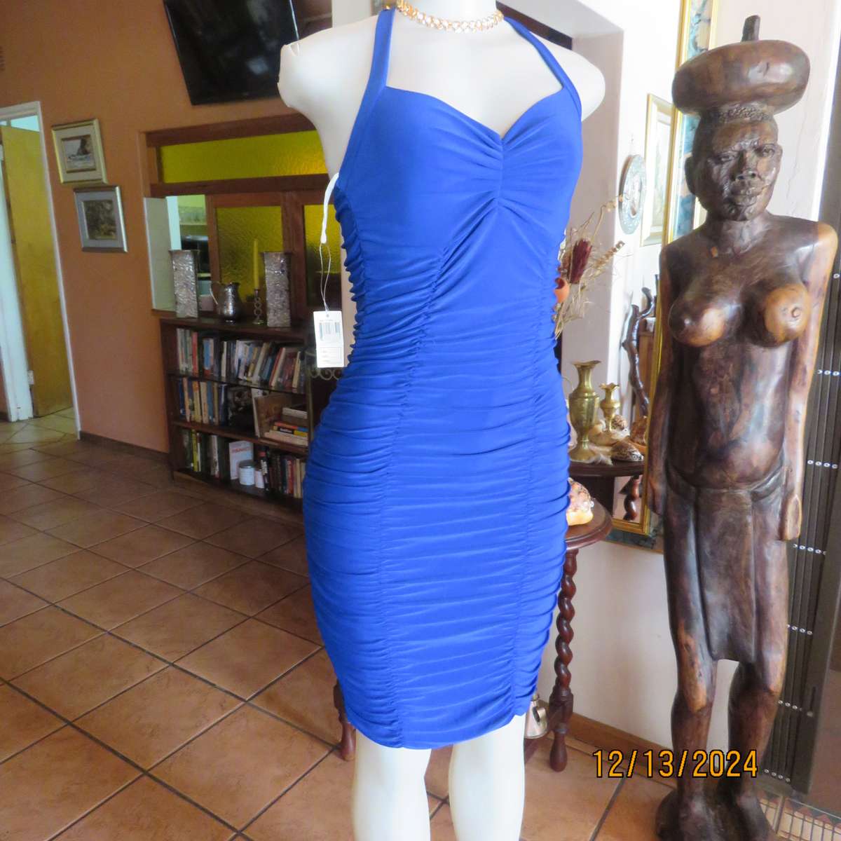 Stunning royal blue stretch polyester bodycon halter neck evening dress.Vertical elasticated.Size 34