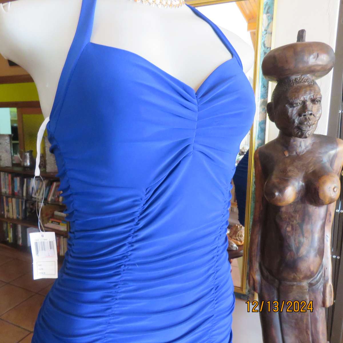 Stunning royal blue stretch polyester bodycon halter neck evening dress.Vertical elasticated.Size 34